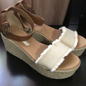 Brown anda white shoes